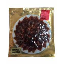 Jamón ibérico bellota cortado cuchillo