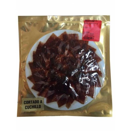 Jamón ibérico bellota cortado cuchillo