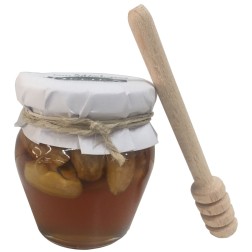 Tarro de miel con almendras y palito catador para empresas