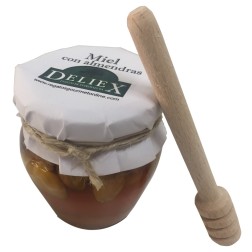 Tarro de miel con almendras y palito catador para empresas