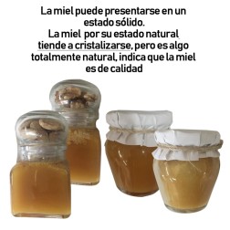 Tarro de miel con almendras y palito catador para empresas